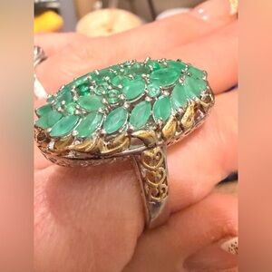 Emerald ring 925 with a gold filigree size 10